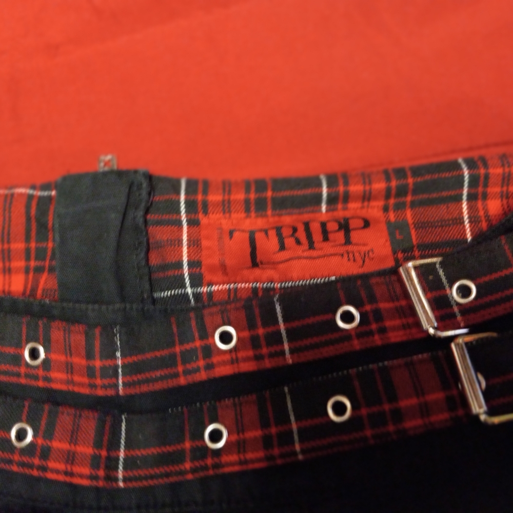 Two (2) tripp skirts one irreversible